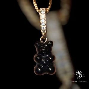 Brand new black teddy bear necklace comes with a dust bag